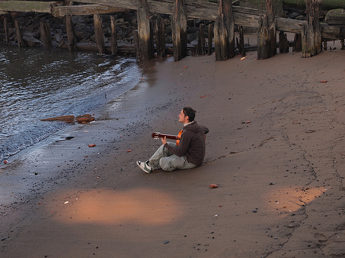 banjo picking by the water