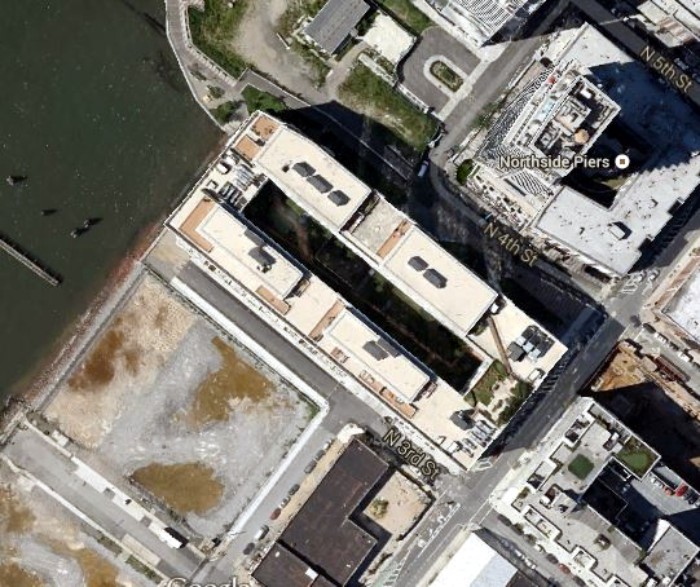 Aerial view showing building center courtyard. Photograph: Google Earth