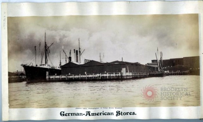 German American Stores, pier. 1880 photograph by Joseph Hall. Brooklyn Historical Society