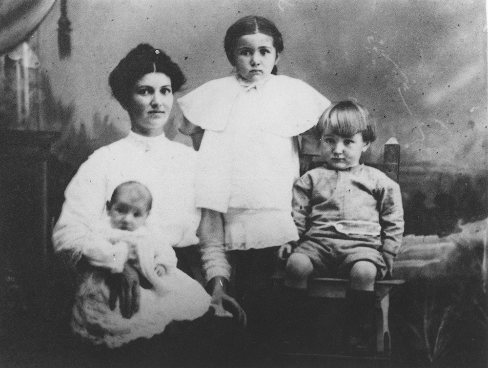 Angele: a picture of my Great Grandmother Angele (ne. Lejeune) Buckley with 3 of her 13 children; the baby she is holding is my Grandfather Gilbert Buckley.