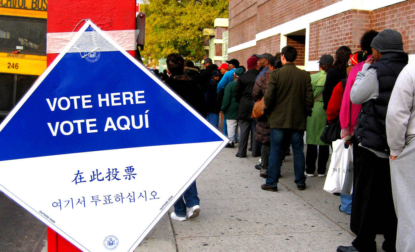 Voters line up along Brooklyn's Church Avenue during the 2008 presidential elections. Photo by April Sikorski via Wikipedia