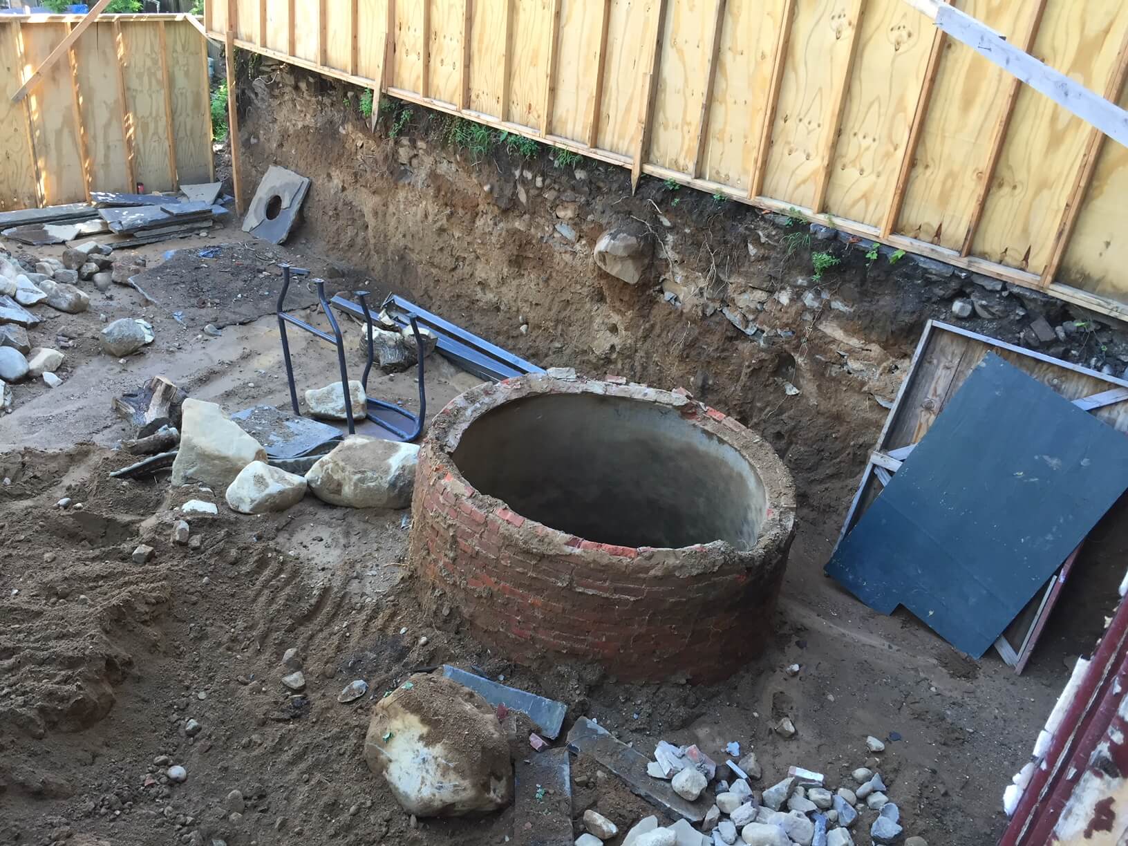 A well uncovered during the project. Photo via Amber Mazor