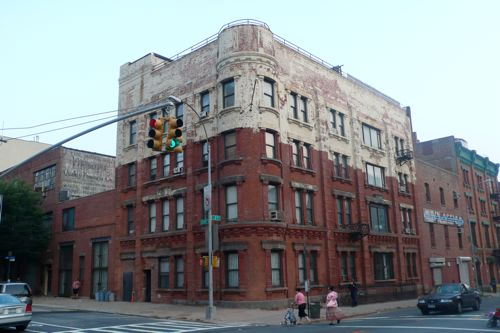 brick building half painted
