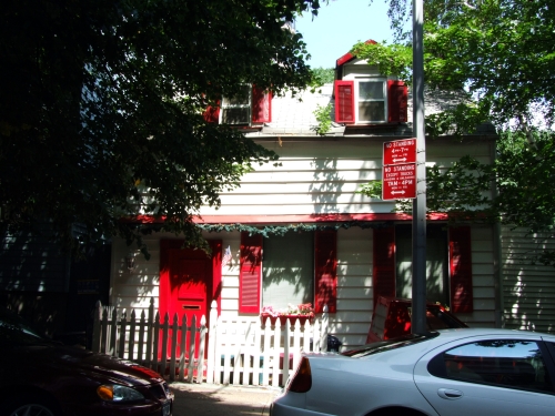 house with red shutters