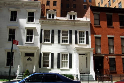 wood frame house with dormers