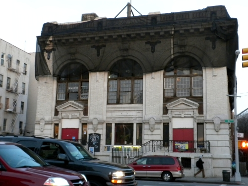 netting on a brick and stone building