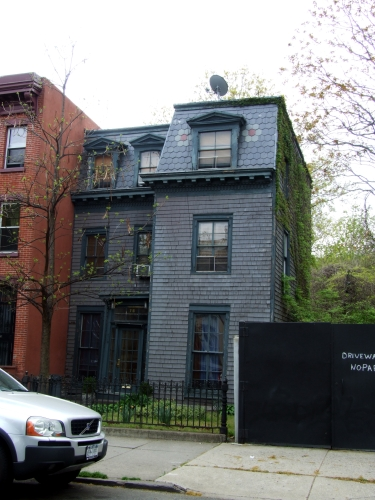 mansard roofed house