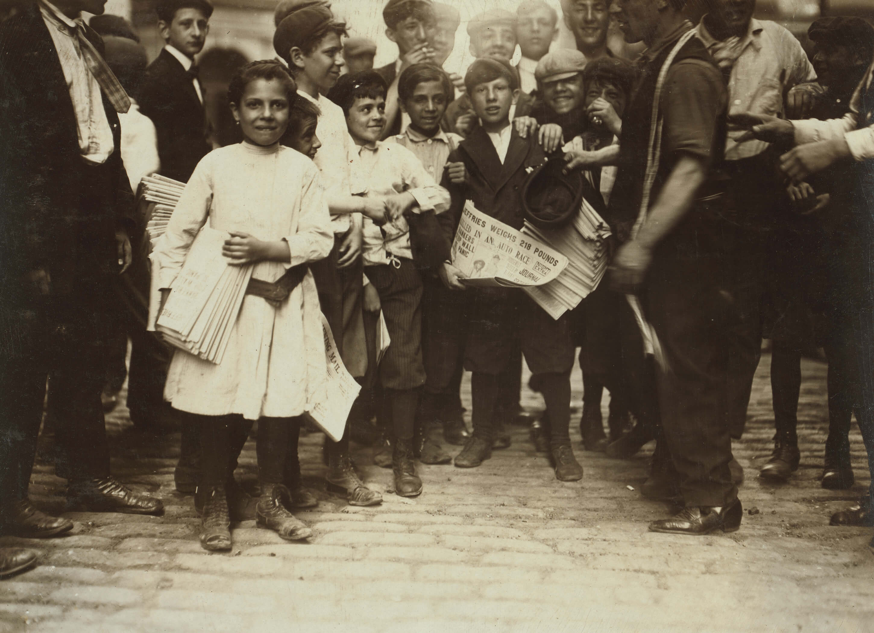 children selling newspapers