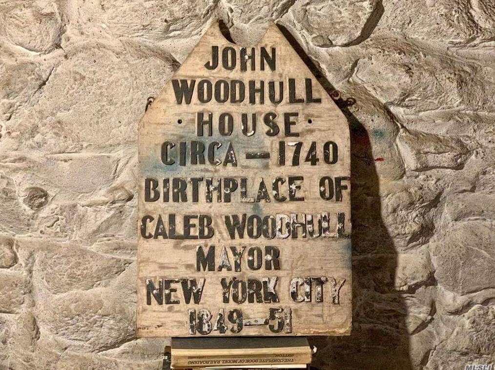 plaque at the woodhull house