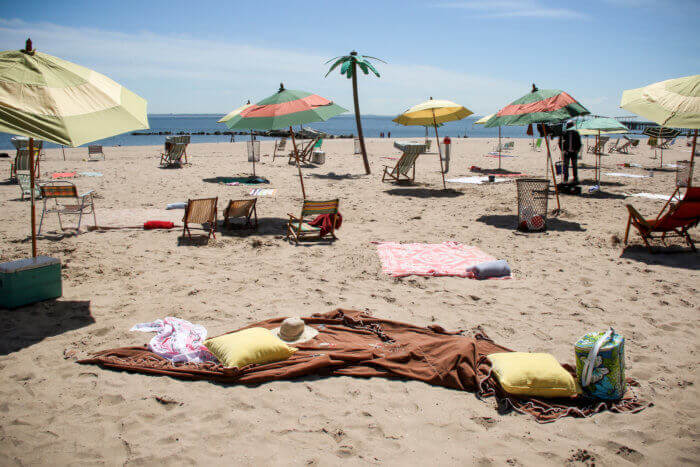 beach blankets on the Coney Island sand