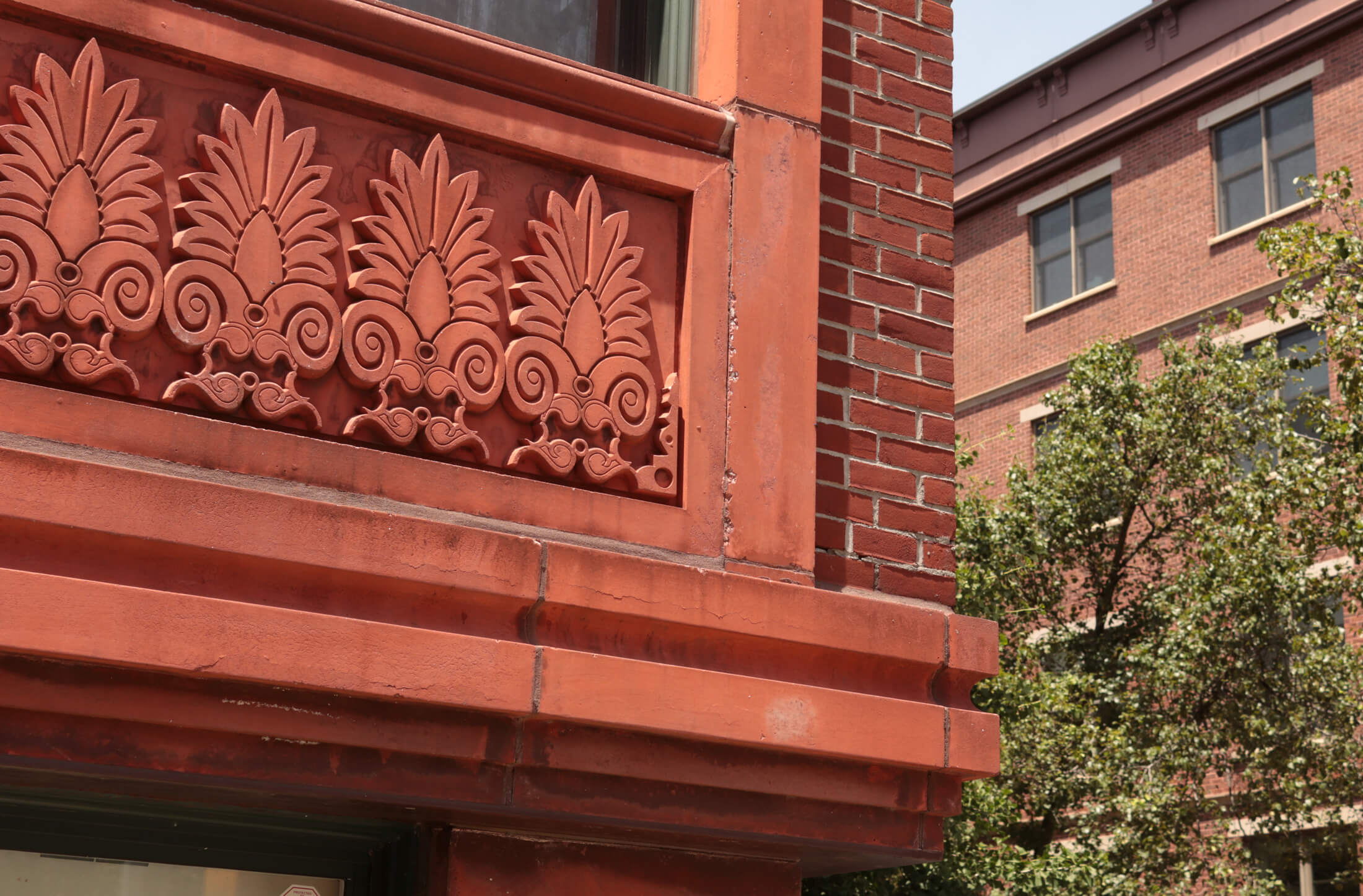 anthemion detail on a building in Park Slope