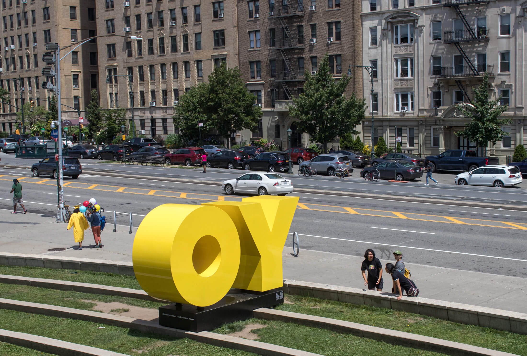 a sculpture in front of the brooklyn museum in park slope