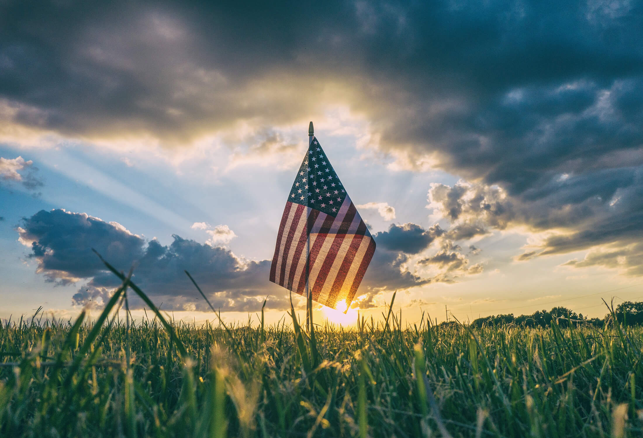 an american flag in a field