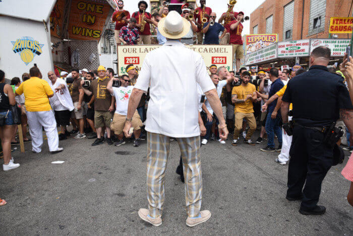 Mike Avedo, center, directs a lift