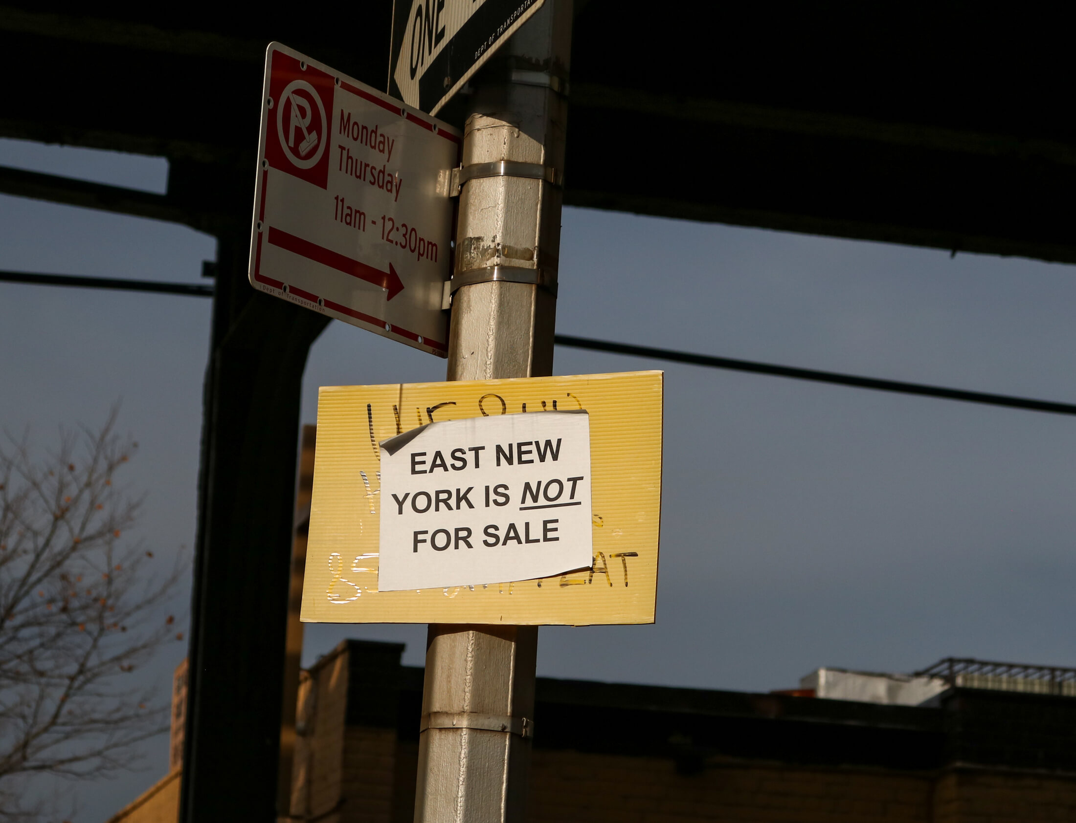 east new york is not for sale sign on lightpole