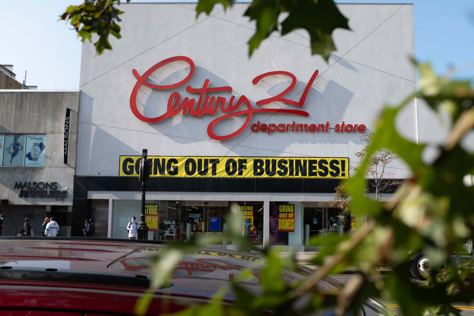 exterior of the century 21 store with going out of business sign