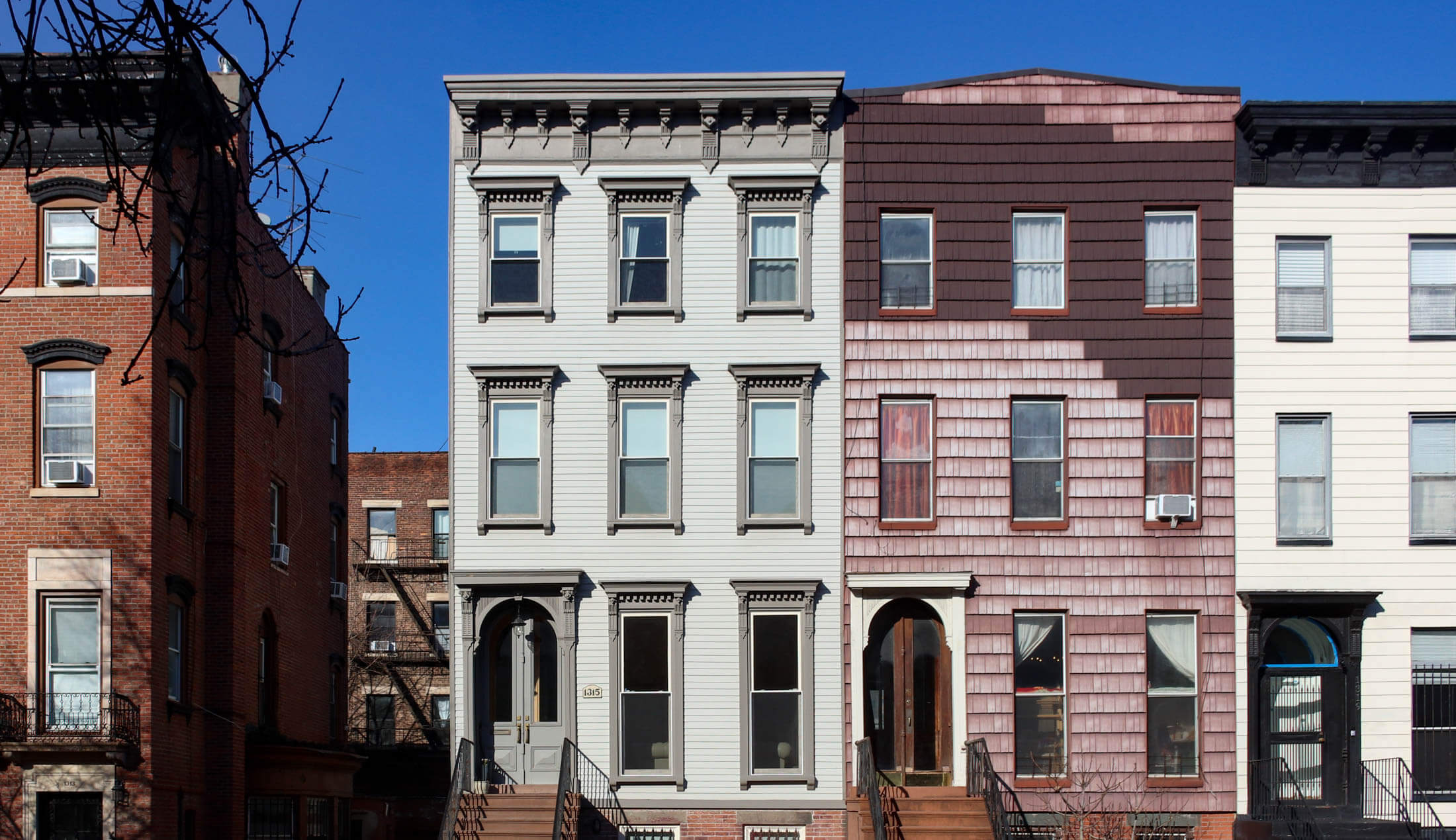 exterior of wood frame houses on dean street