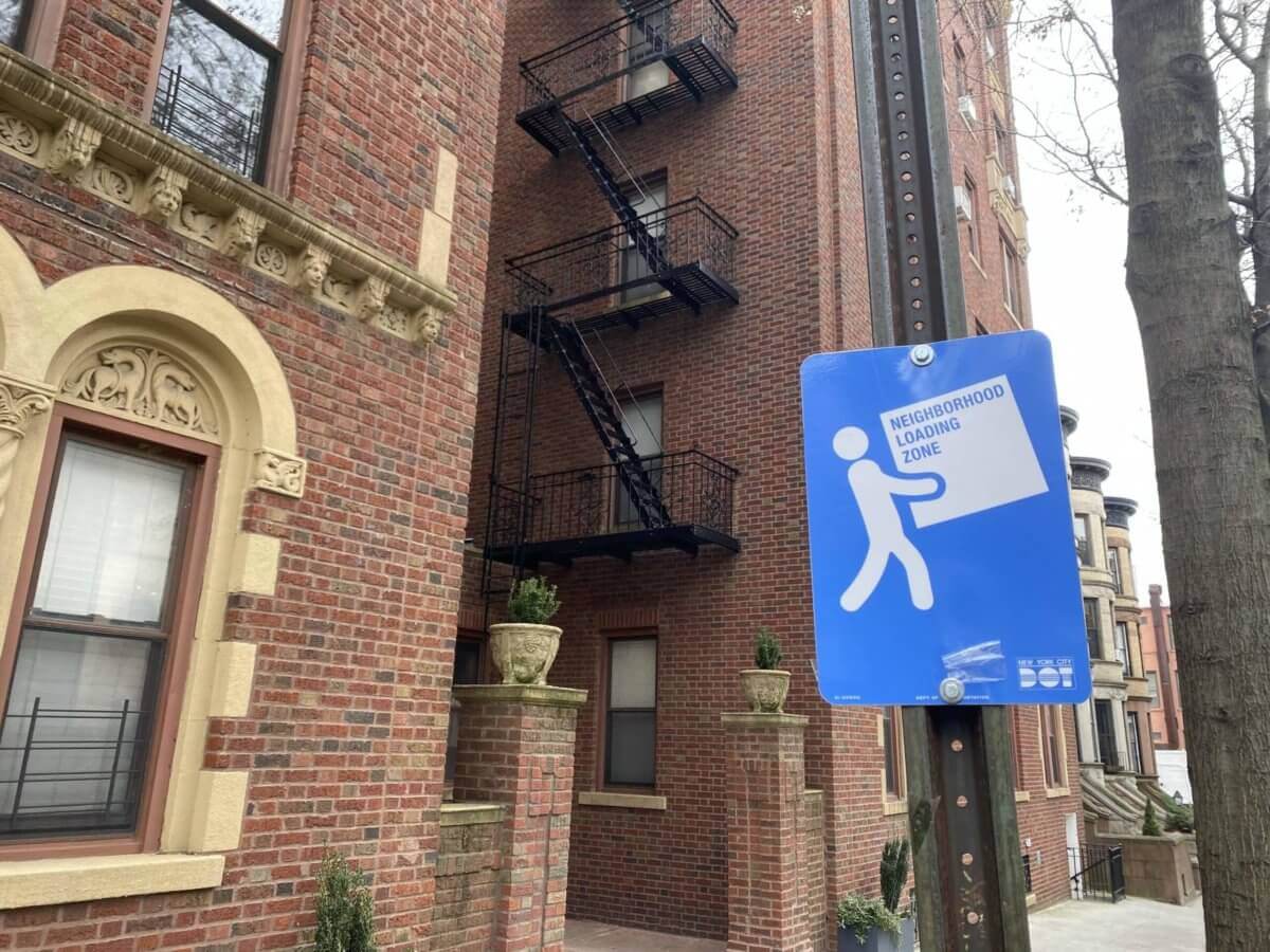 neighborhood loading zone sign