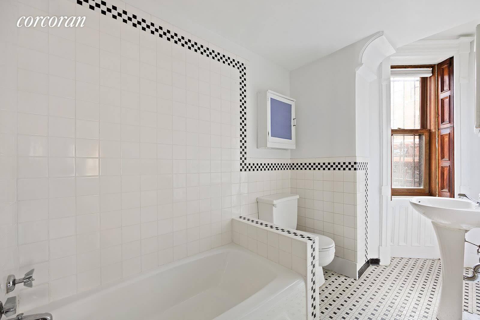 brooklyn home company park slope apartment cococozy bathroom bath sink  black beadboard bead board wall ceiling marble floor shower