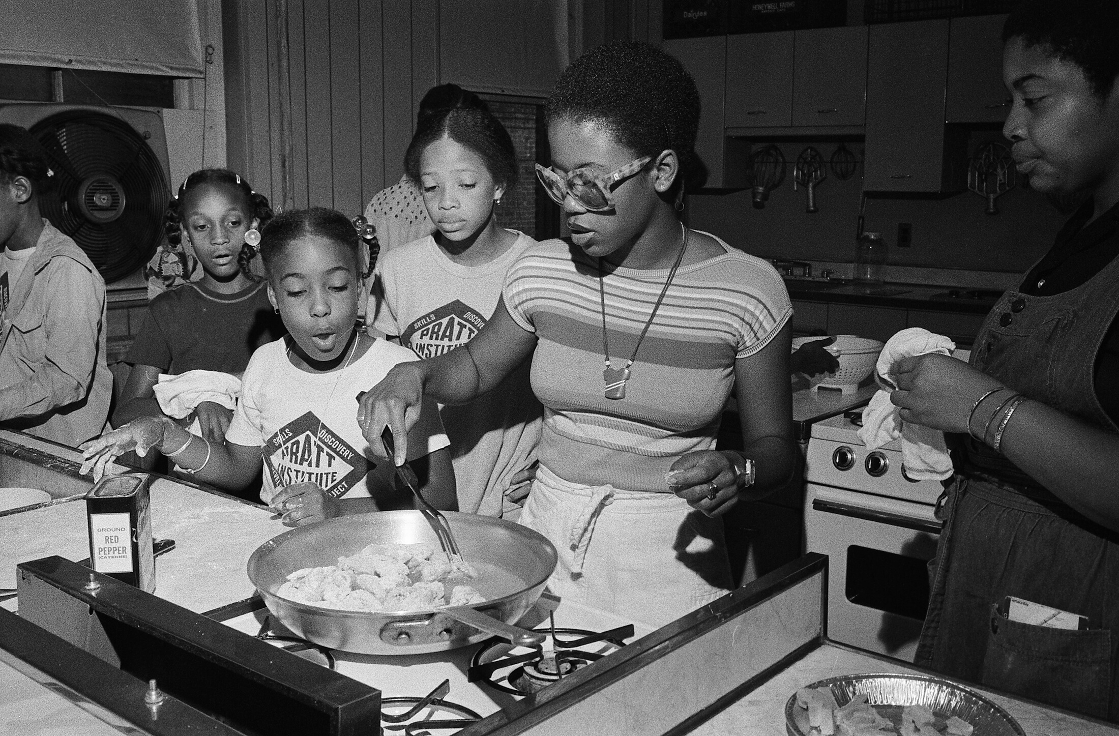 students learning to cook