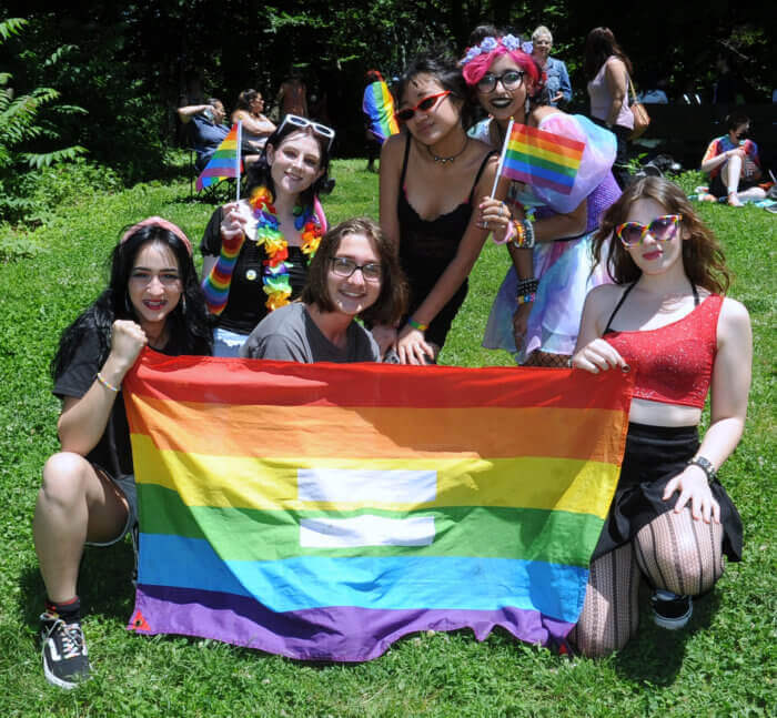 celebrants with pride flag