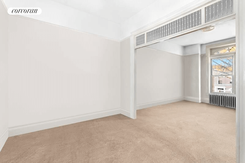 dining room with fretwork and carpet