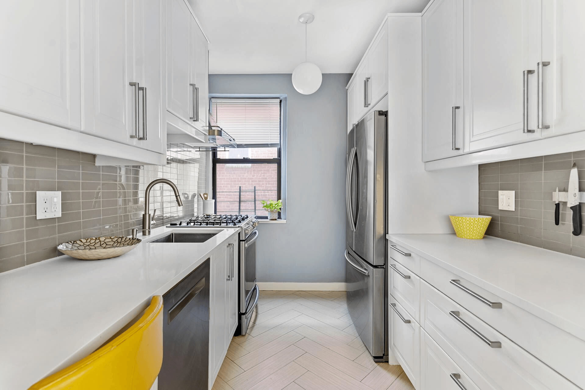 kitchen with white cabinets in apt 4C in 385 argyle road