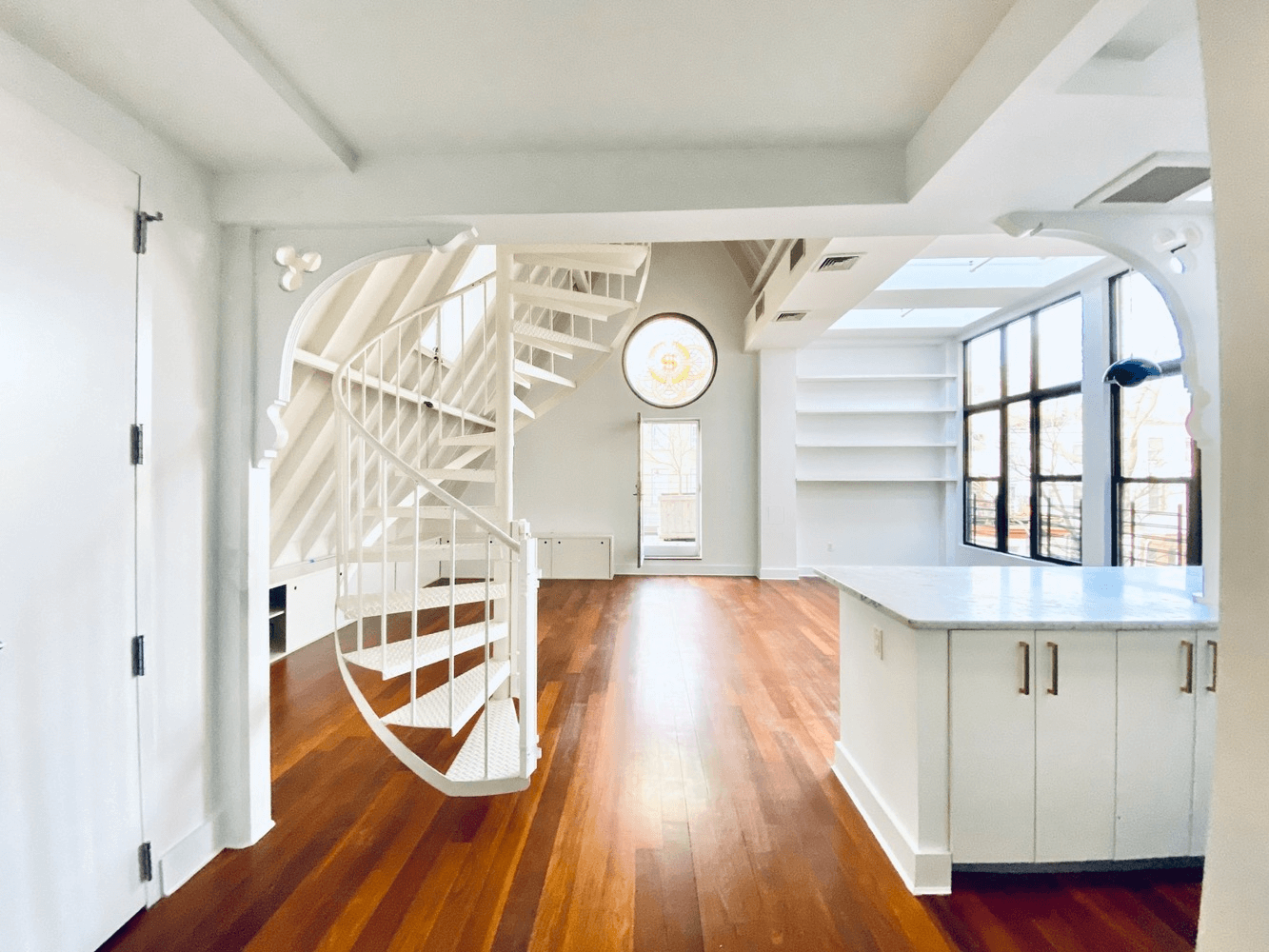 view from entry to kitchen and living room