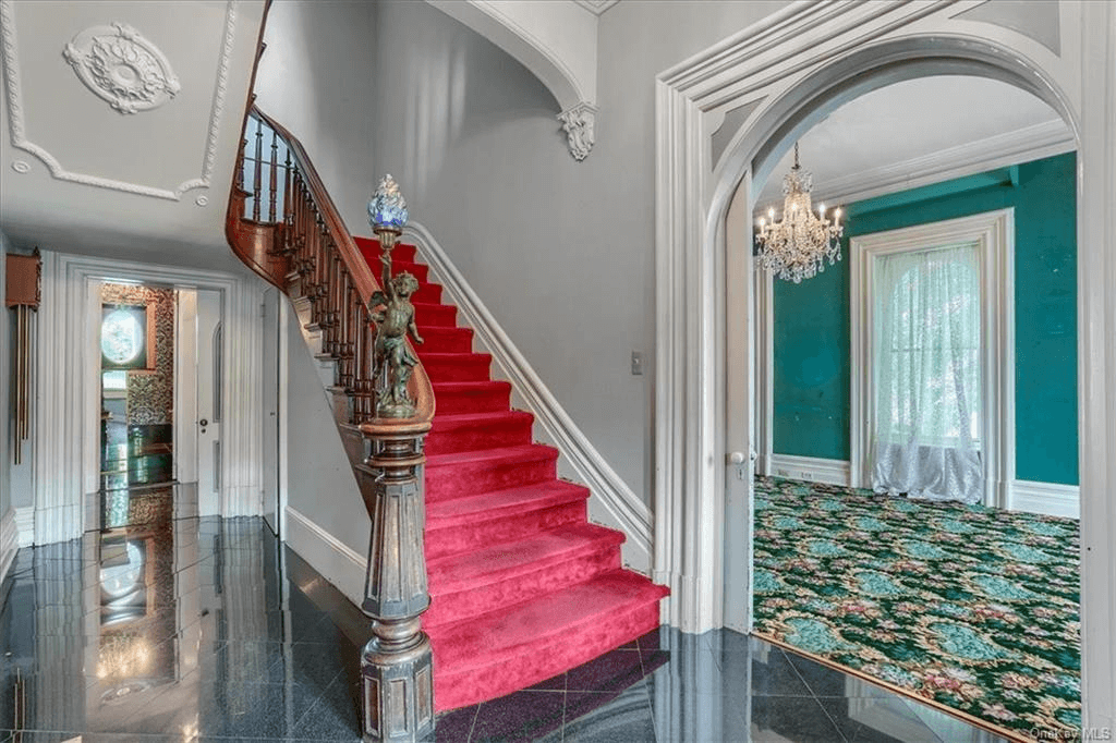 entry with stair and view into dining room in 313 main street goshen