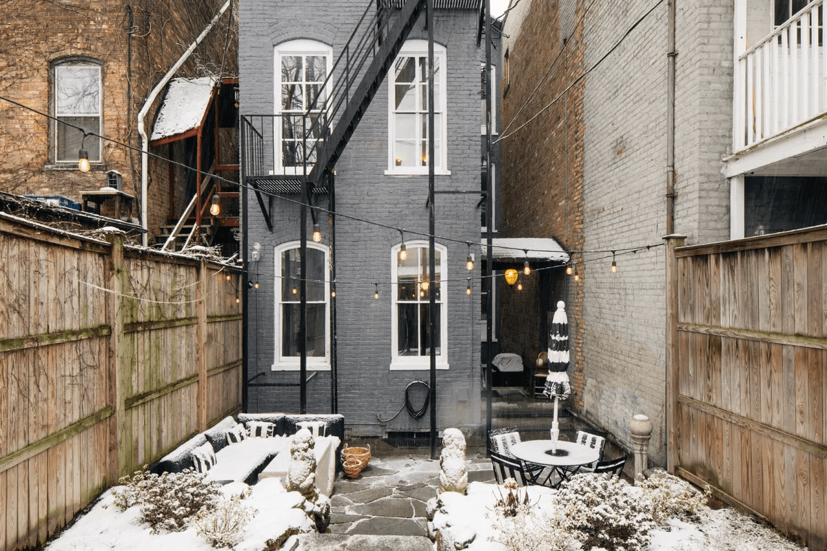 rear of the house with painted brick facade