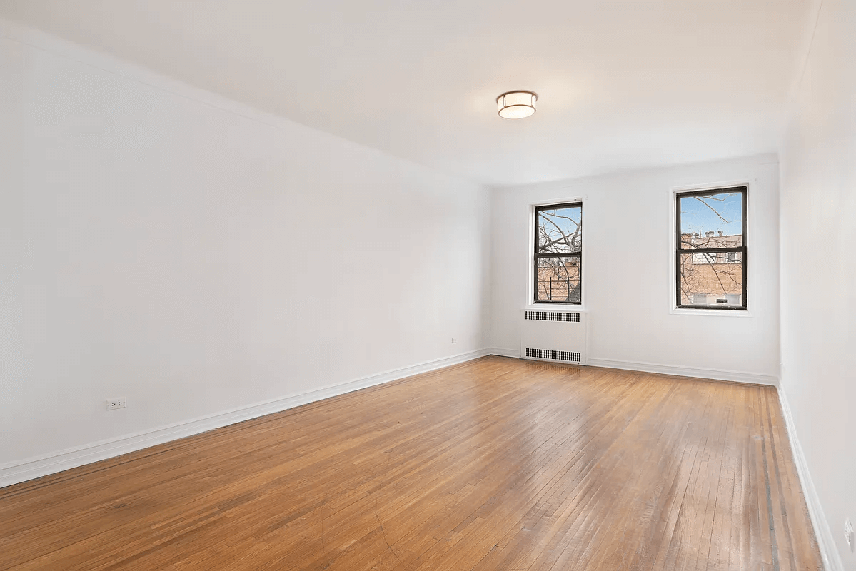 living room with wood floor and ceiling fixture