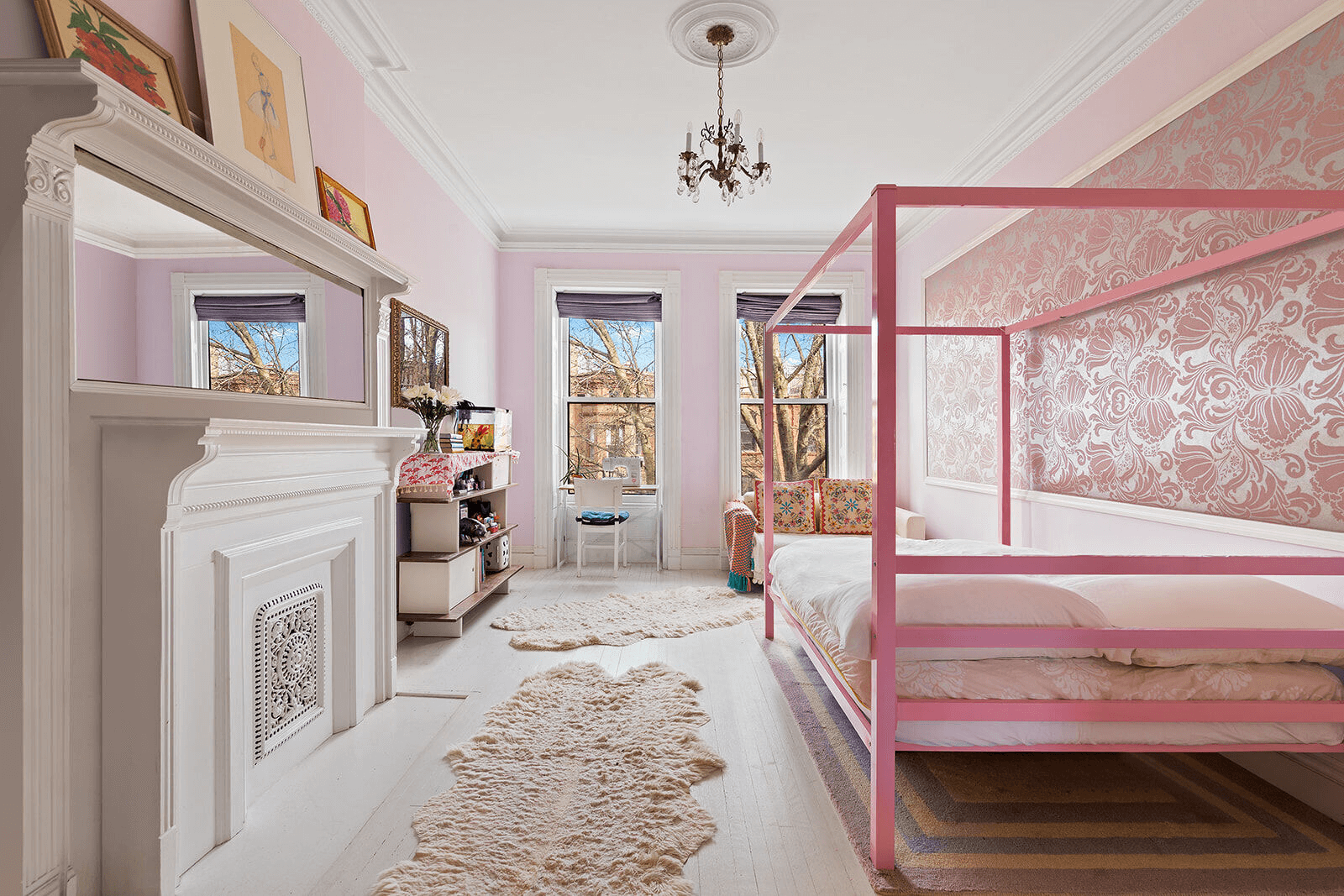 bedroom with mantel painted white