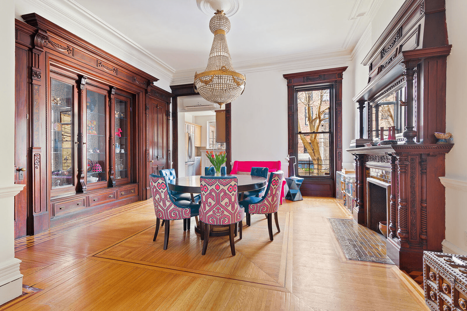 dining room with built-ins and mantel