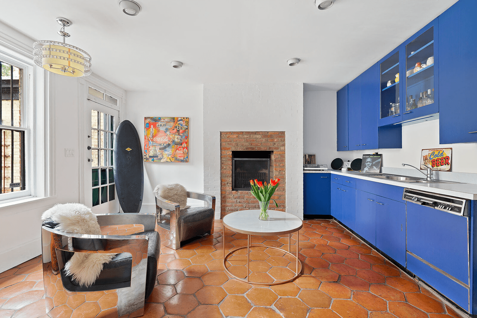 garden level kitchen with bright blue cabinets
