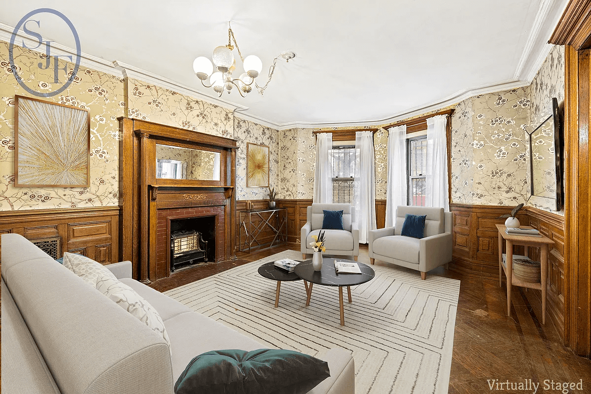 virtually staged original dining room set up as a living room at 160 midwood street