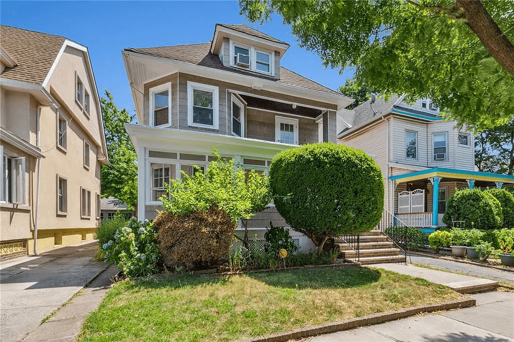 front view of 761 east 22nd street some shrubbery and lawn