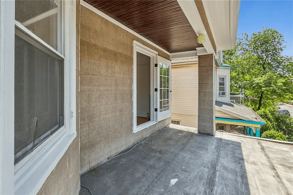 view of terrace with slatted wood ceiling and no railing at 761 east 22nd street