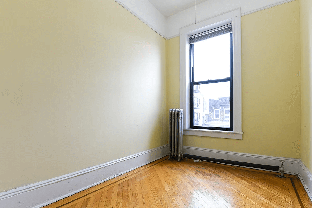 bedroom with wood floor