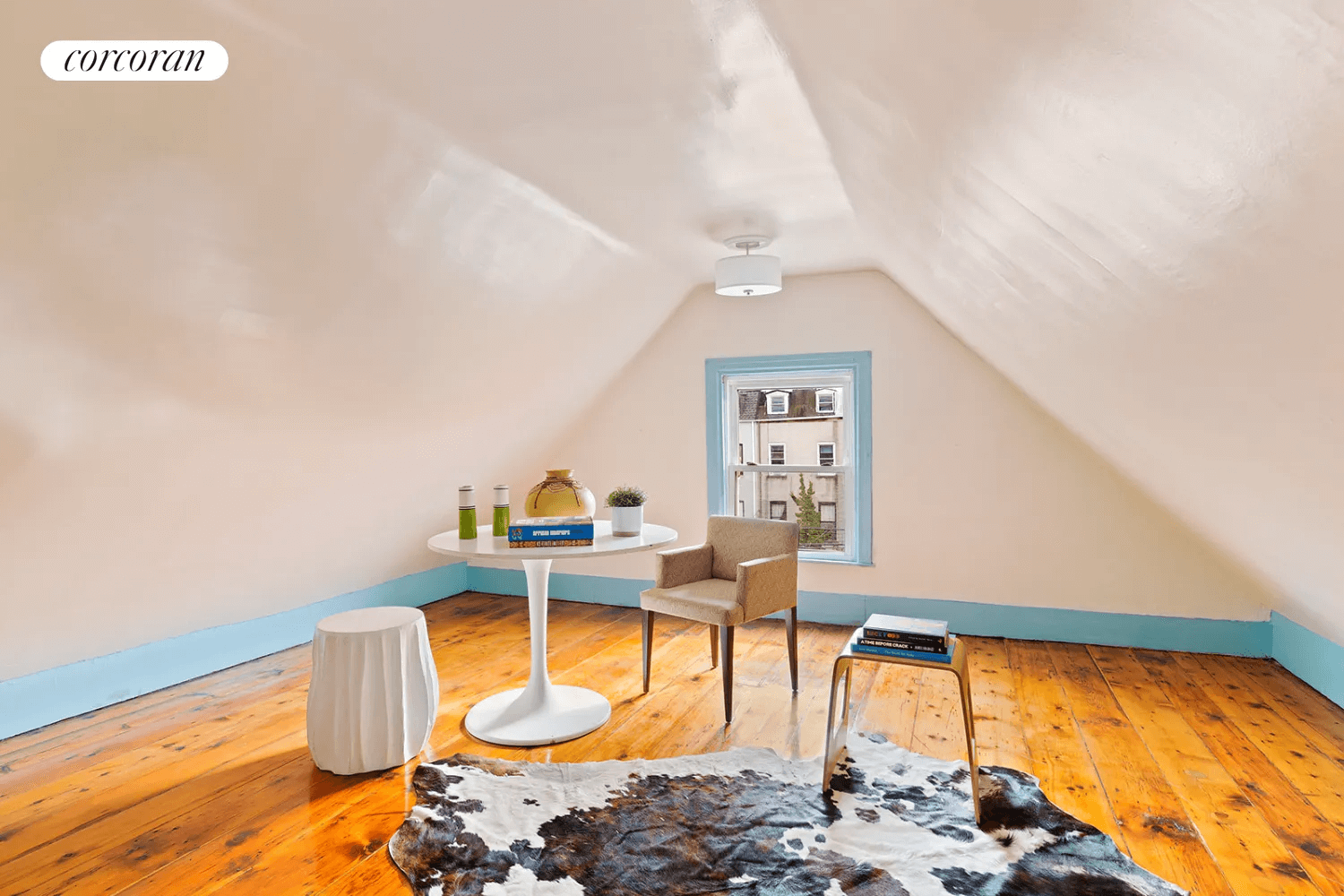 attic room with wood floor