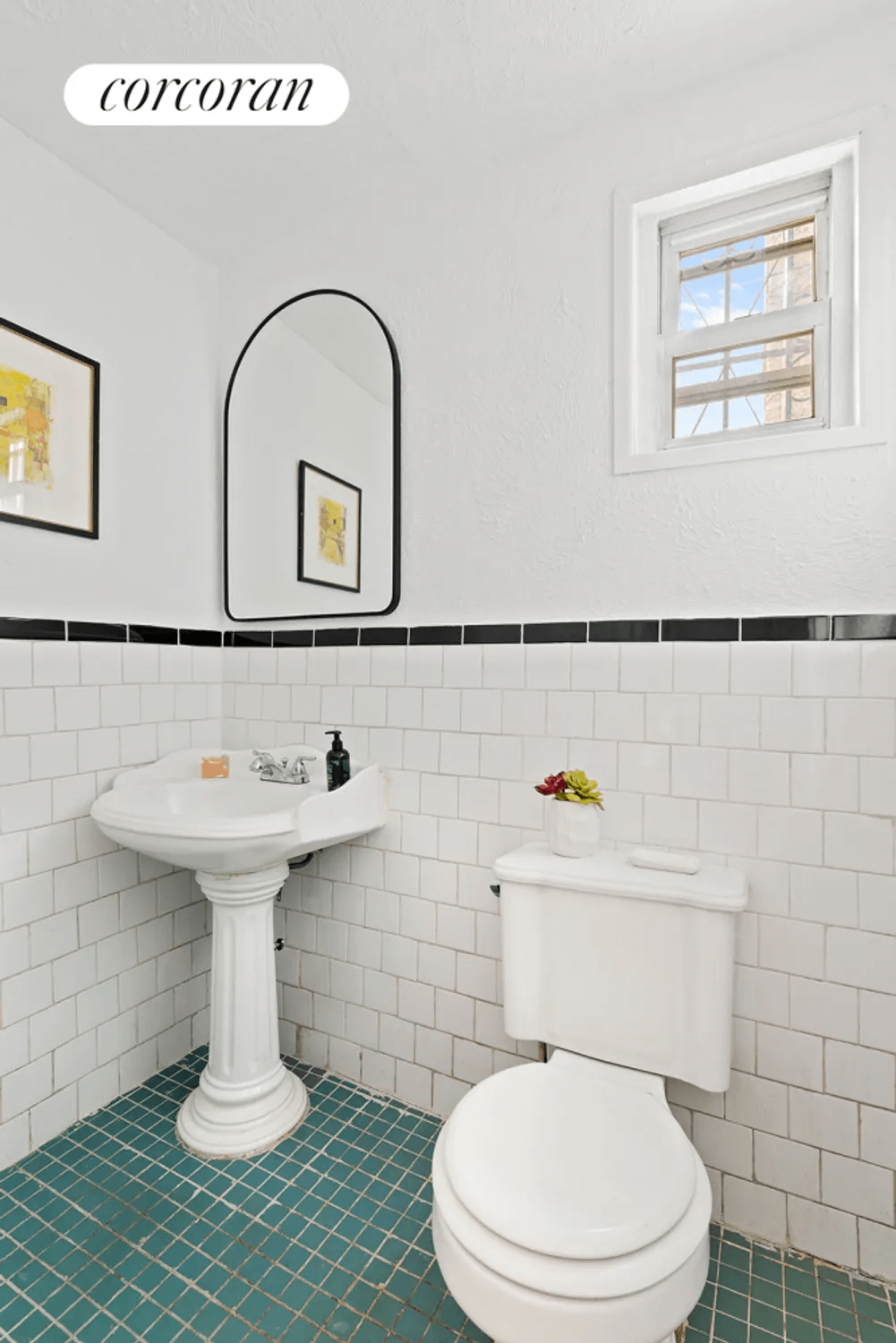 bathroom with white wall tile and green floor tile