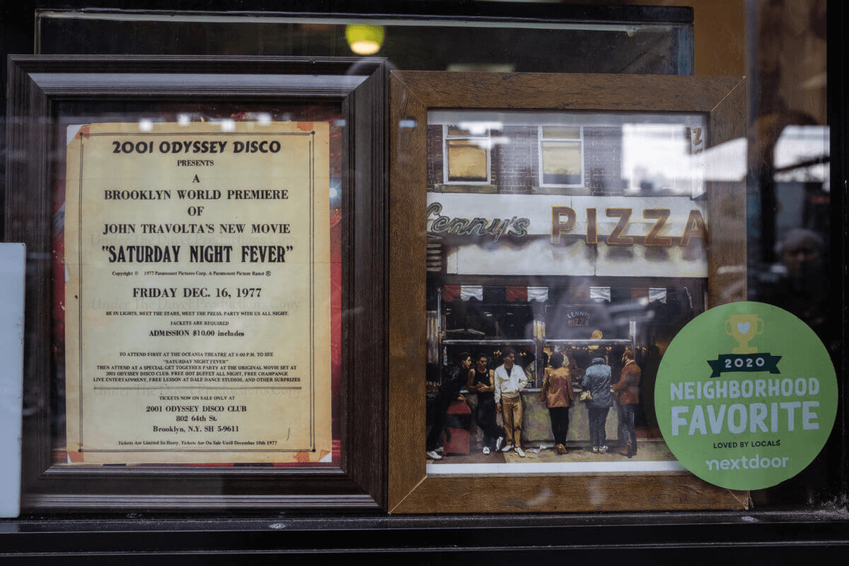 plaque and photo of saturday night fever cast