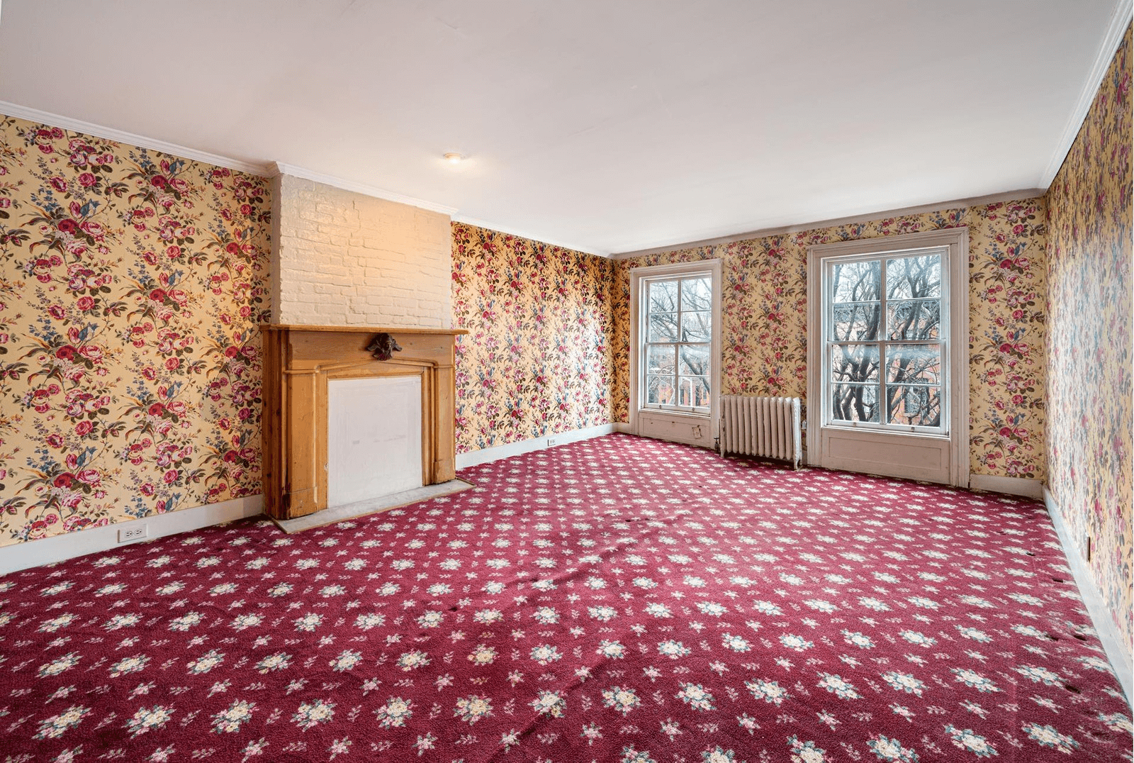 bedroom with wallpaper and carpet