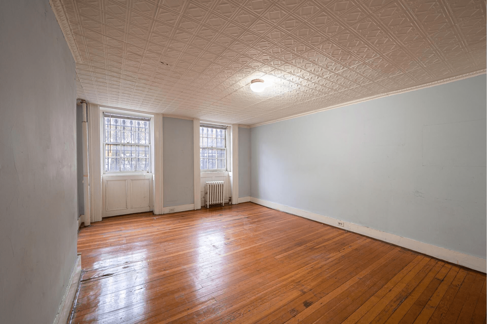 bedroom with tin ceiling