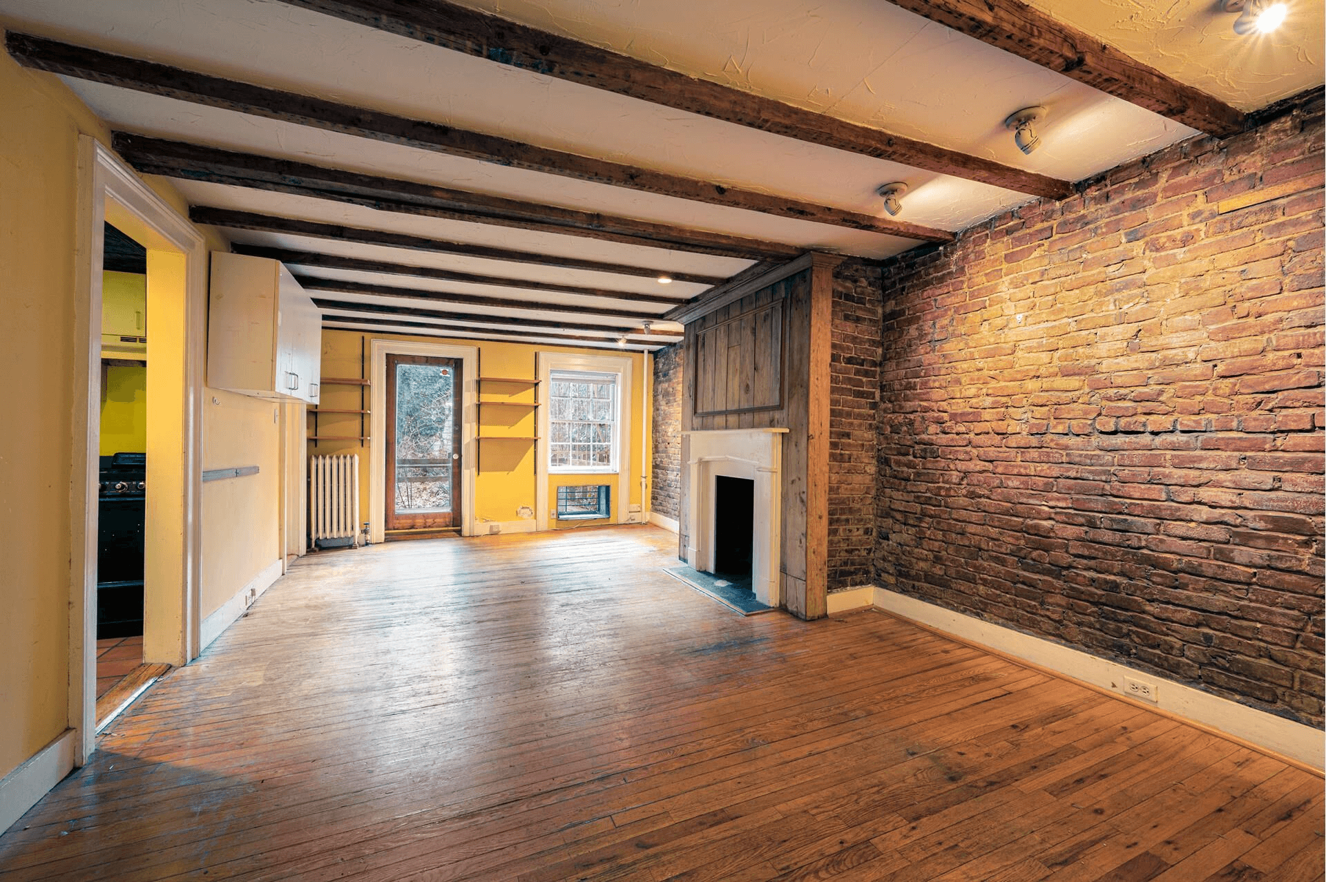 dining room with exposed brick wall
