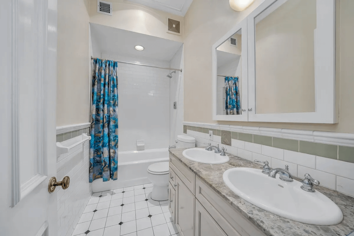 bathroom with double vanity