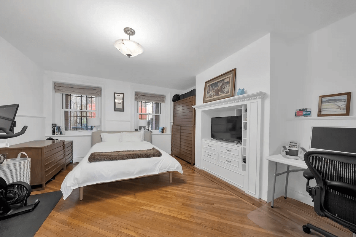 bedrom with wood floor