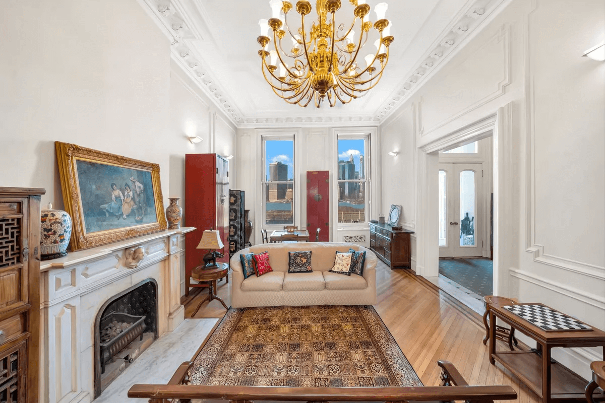 parlor with mantel and plasterwork