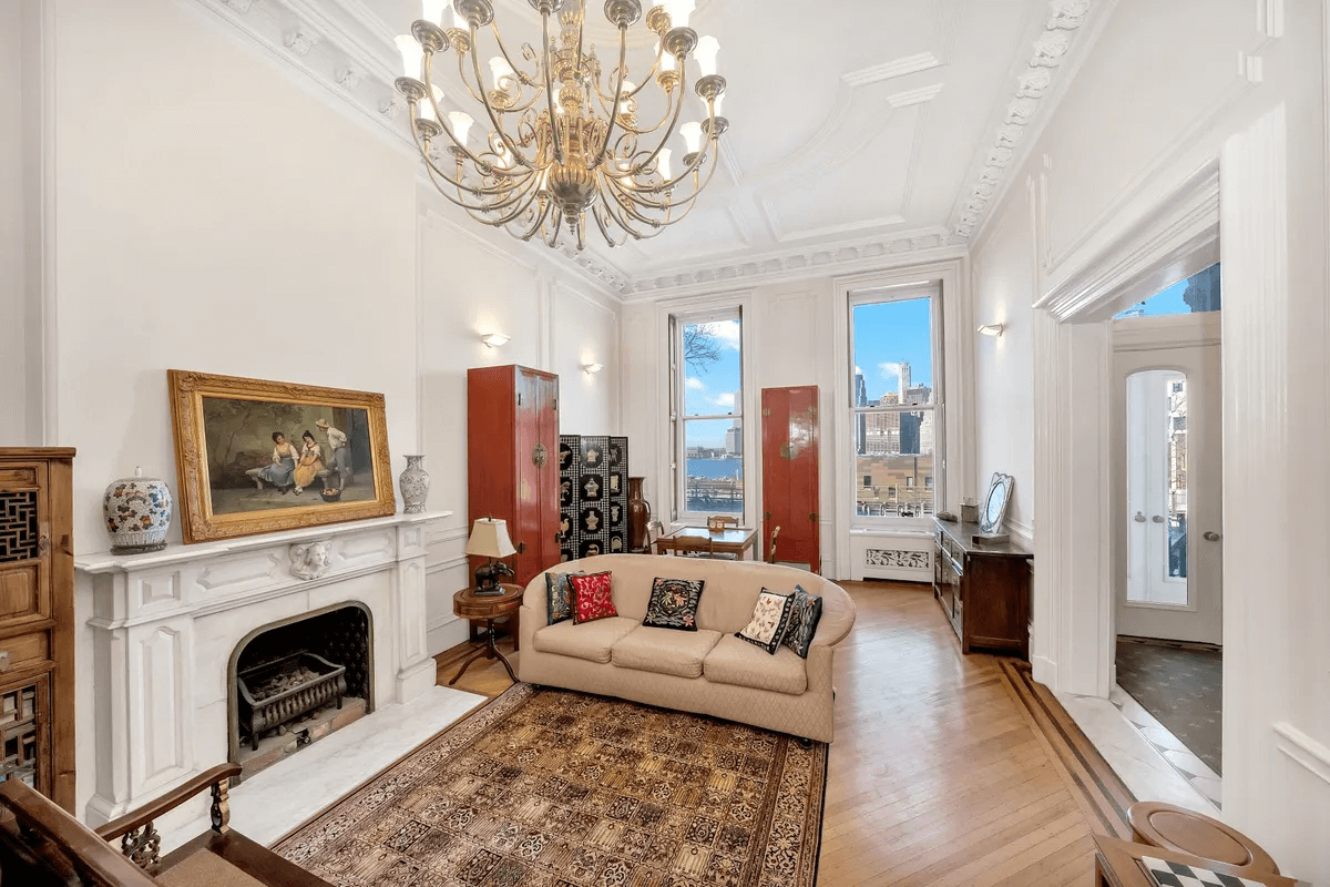 parlor with mantel and plasterwork