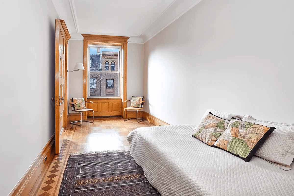 bedroom with wood floors