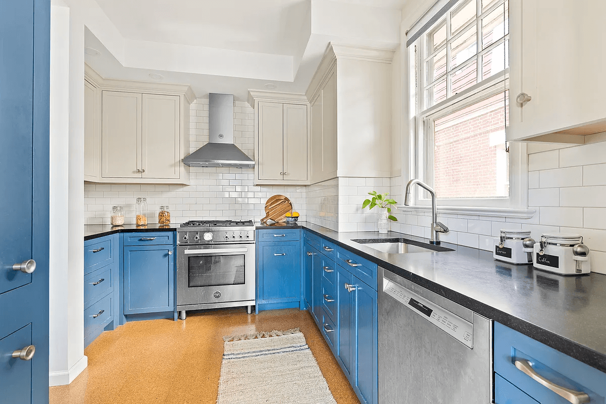 kitchen with blue lower cabinets